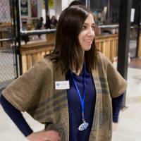 An alumna poses for a photo at the Fowling Fun Event
